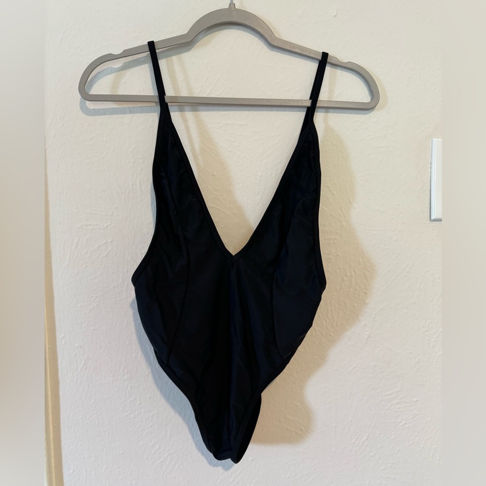 Women’s plunge neck one piece swimsuit
